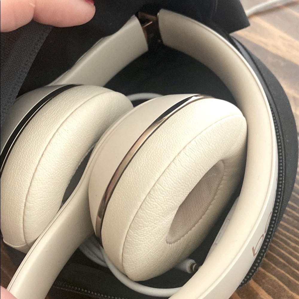 Beats by Dre cream and gold